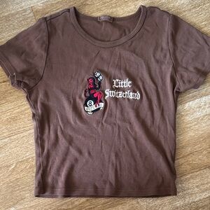 John Galt Little Switzerland baby tee